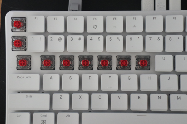 Updated PI 500+ Keyboard with some keys removed showing Gateron Silent Red switches.
